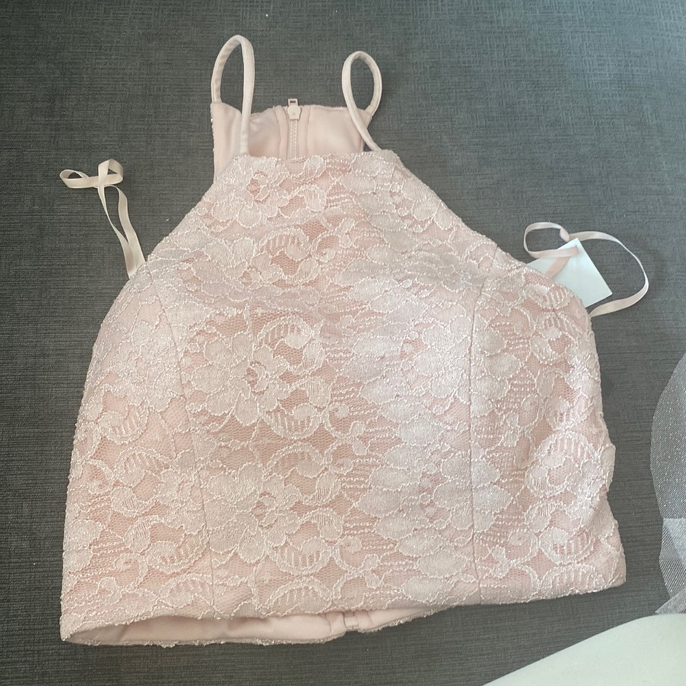 Size 3 brand new 2 piece prom type dress. With tags. Brand is teeze me. Cute!